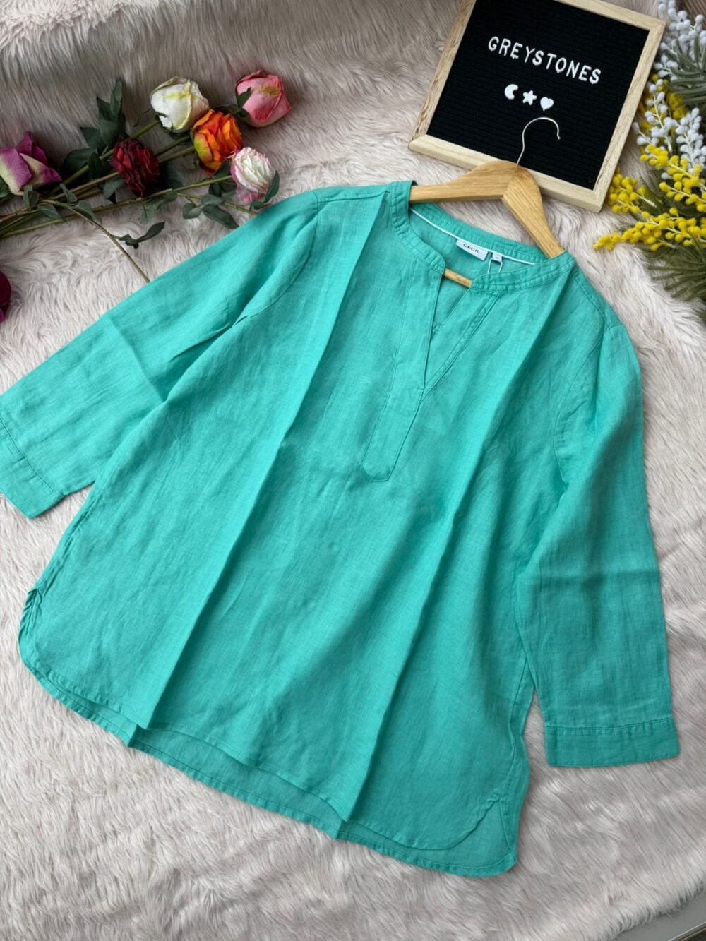 Aqua green linen women’s top with V-neck and 3/4 sleeves