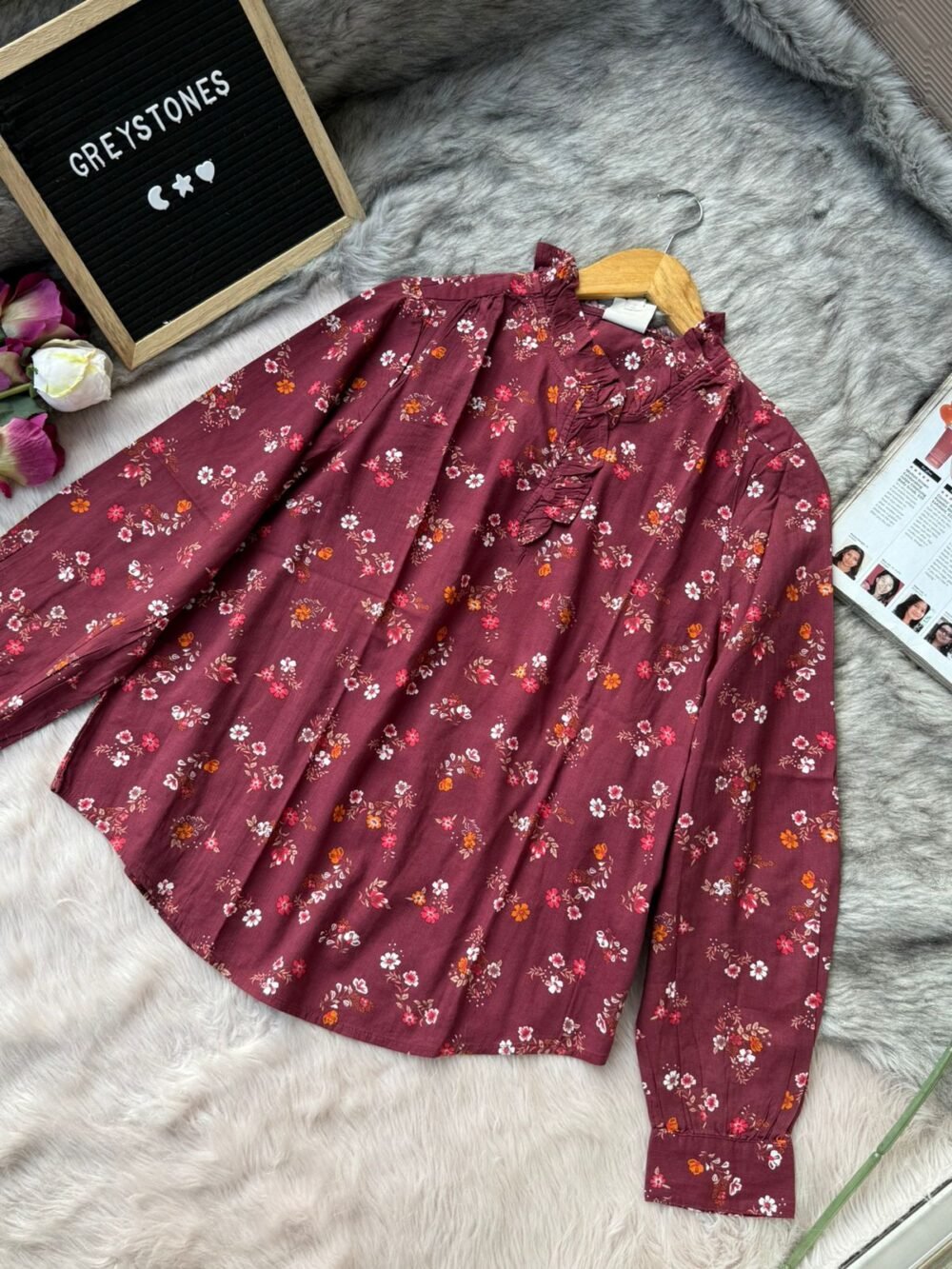 Women’s burgundy floral blouse with ruffle neck and long sleeves