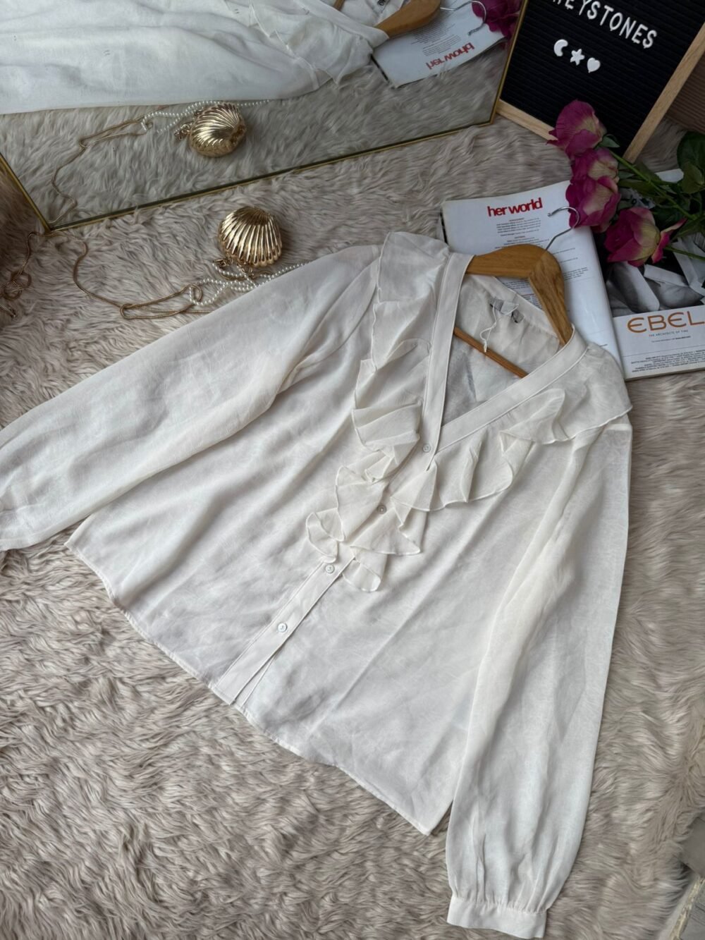 Women’s ivory white ruffle V-neck chiffon top with button-down closure, lightweight and stylish for everyday wear