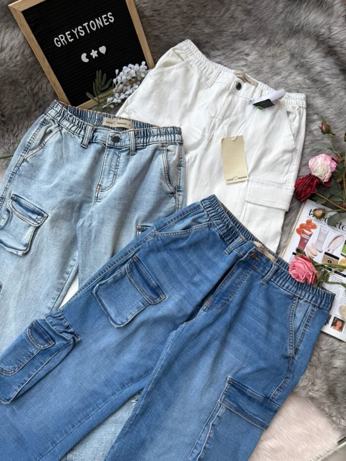 elastic waist cargo jeans in light blue, dark blue, and white