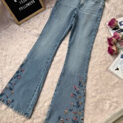 Women’s light blue embroidered flare denim jeans with floral embroidery detail