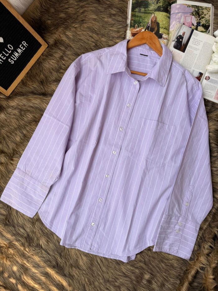Lavender striped cotton button-down shirt for women with relaxed fit, long sleeves, and chest pocket