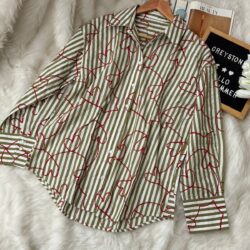 Women’s button-down striped shirt with abstract red heart pattern