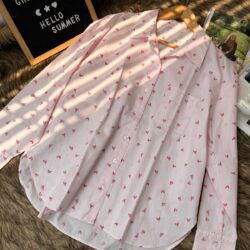 Pink heart print oversized cotton shirt for women with button-down front and long sleeves