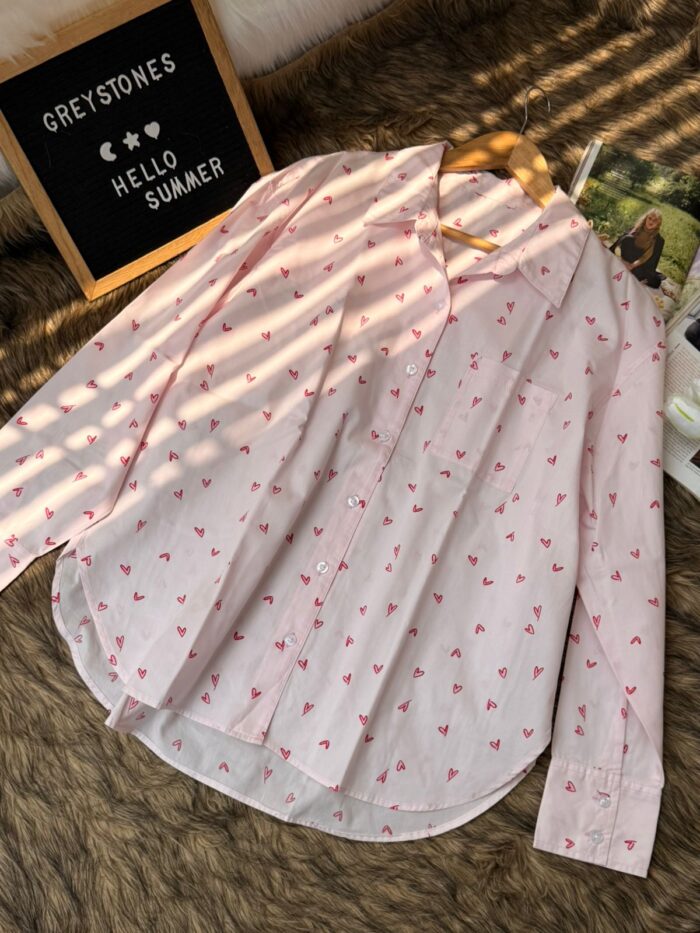 Pink heart print oversized cotton shirt for women with button-down front and long sleeves