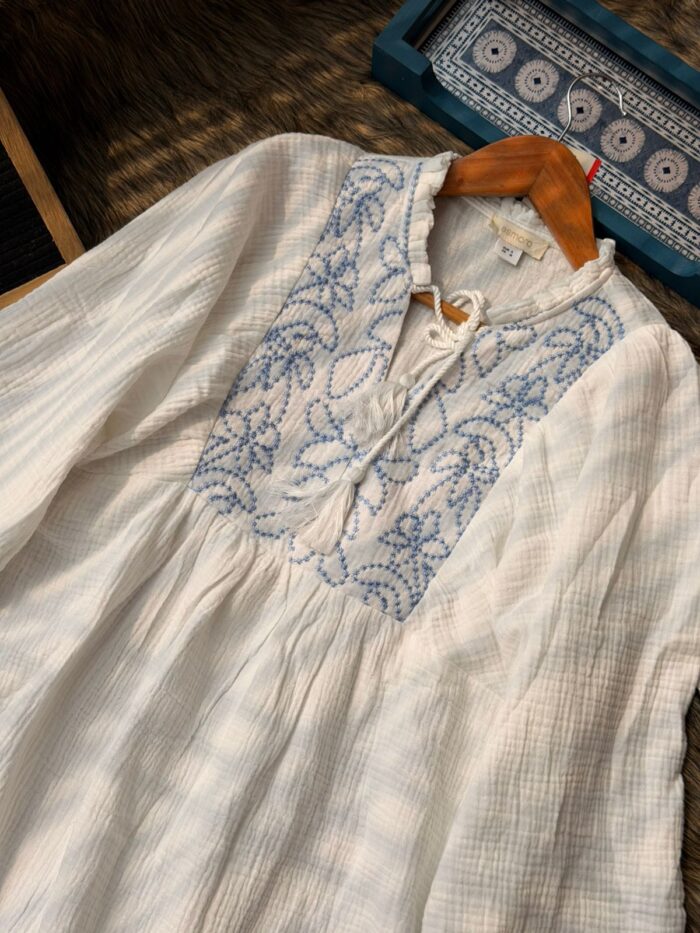 White cotton embroidered tunic top for women with blue detailing, long sleeves, and flowy boho style, perfect for Eid outfit