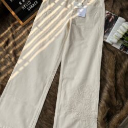 Off-white wide leg cotton pants with floral embroidery detail, high waist women’s pants